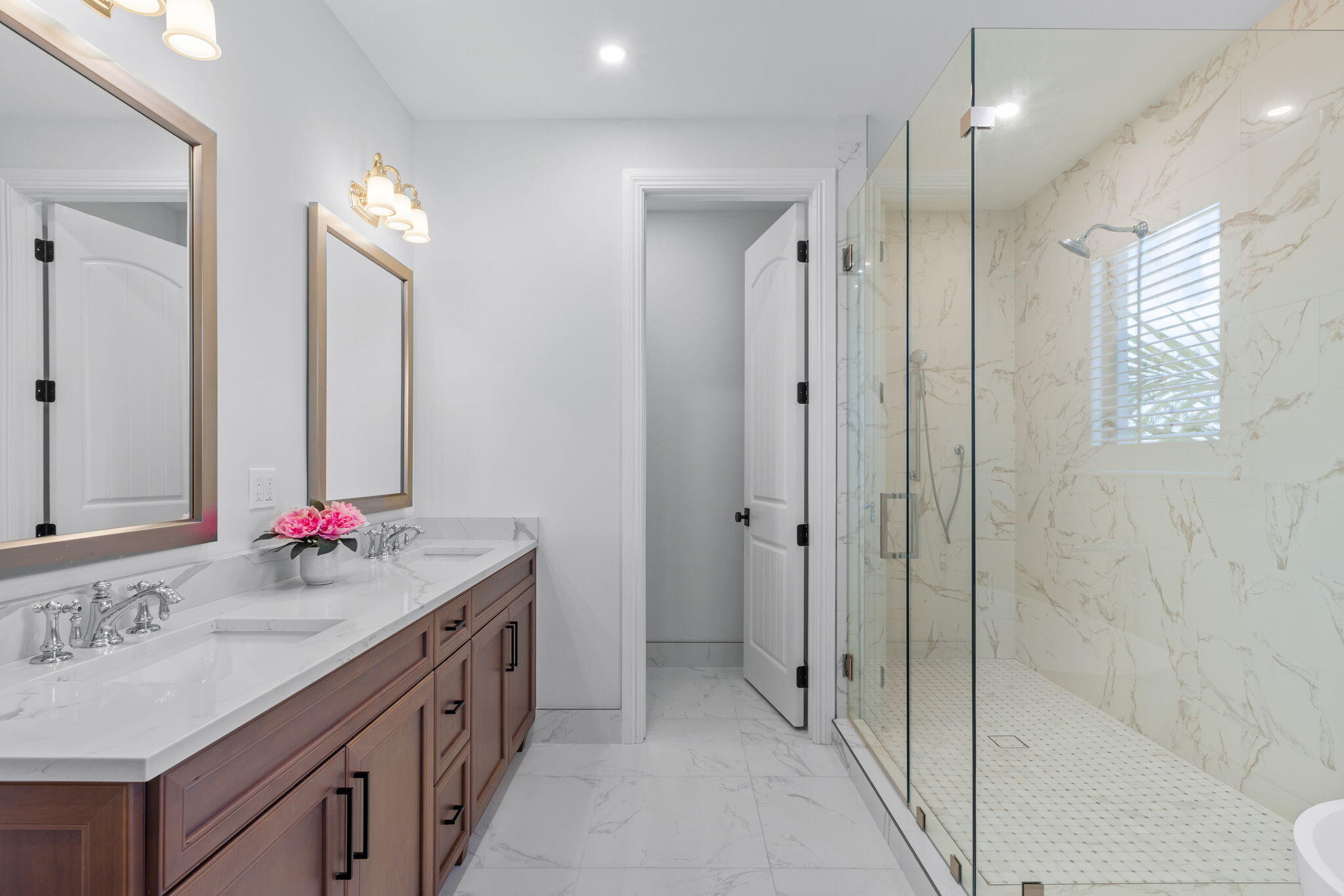 249 Edmor Road West Palm Beach, FL 33405 - Photo 26 of 49 a bathroom with a double vanity sink mirror and shower