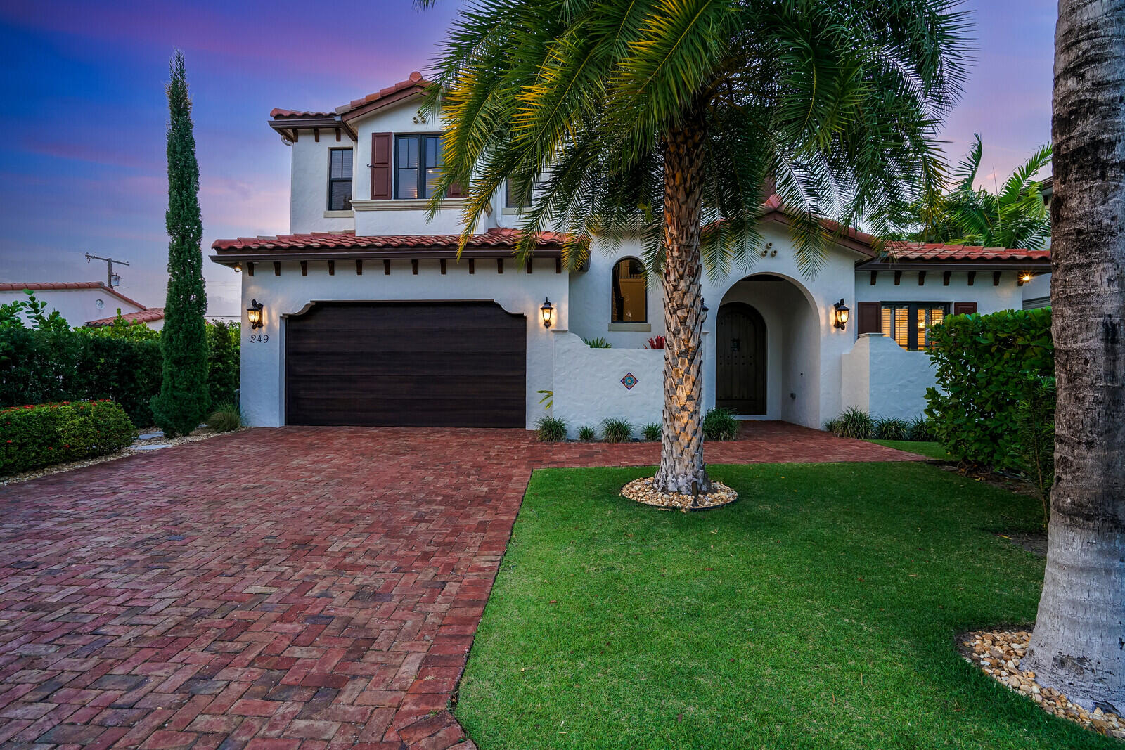 249 Edmor Road West Palm Beach, FL 33405 - Photo 3 of 49 a front view of a house with a garden