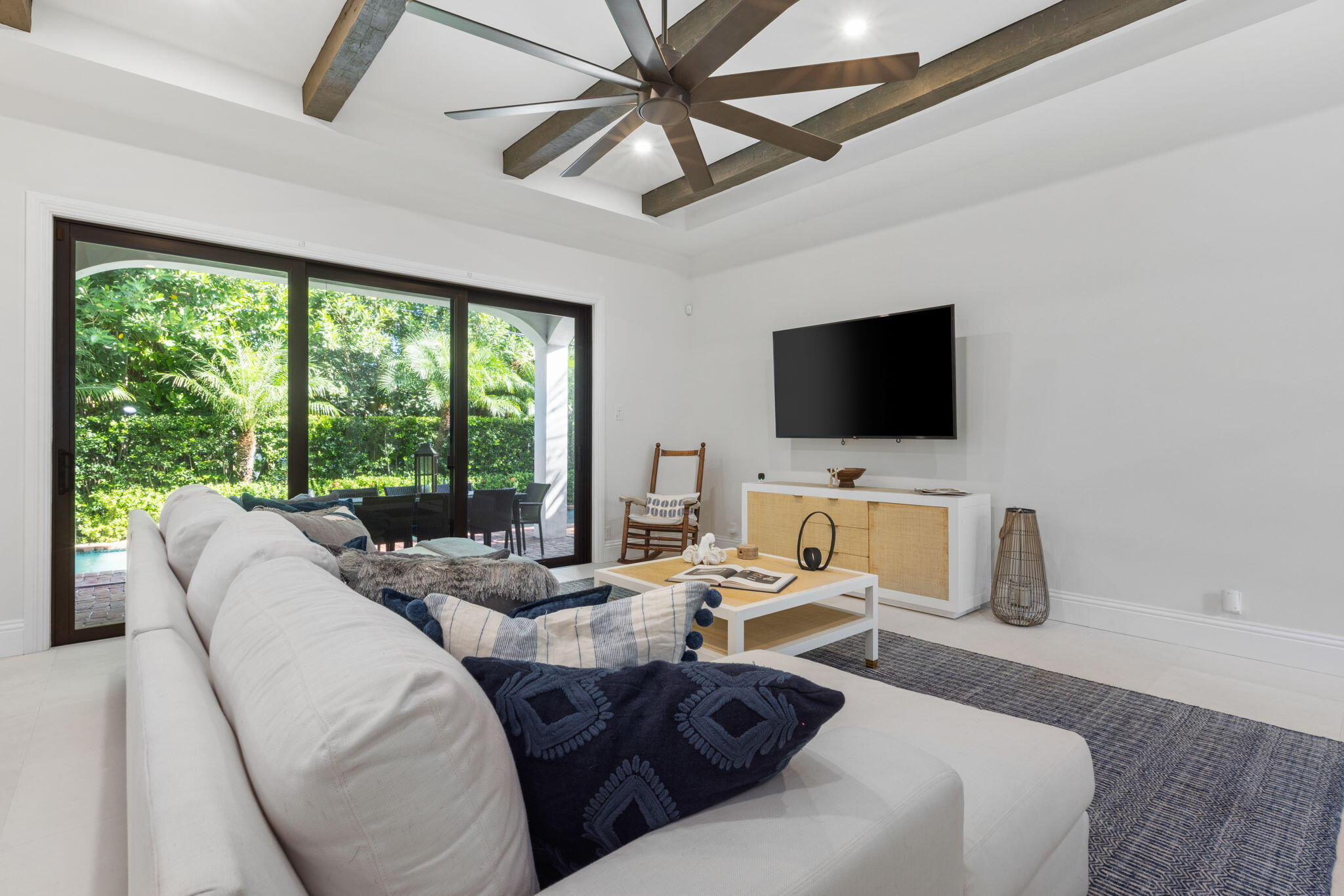249 Edmor Road West Palm Beach, FL 33405 - Photo 7 of 49 a view of a livingroom with furniture and a flat screen tv