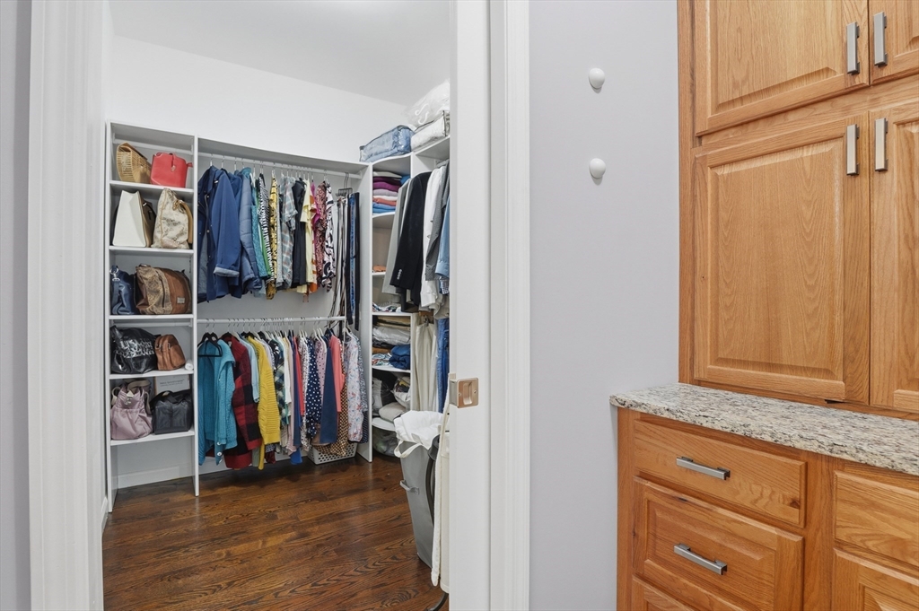 112 Pineland Avenue Worcester, MA 01604 - Photo 34 of 38 a view of walk in closet with clothes and shoes