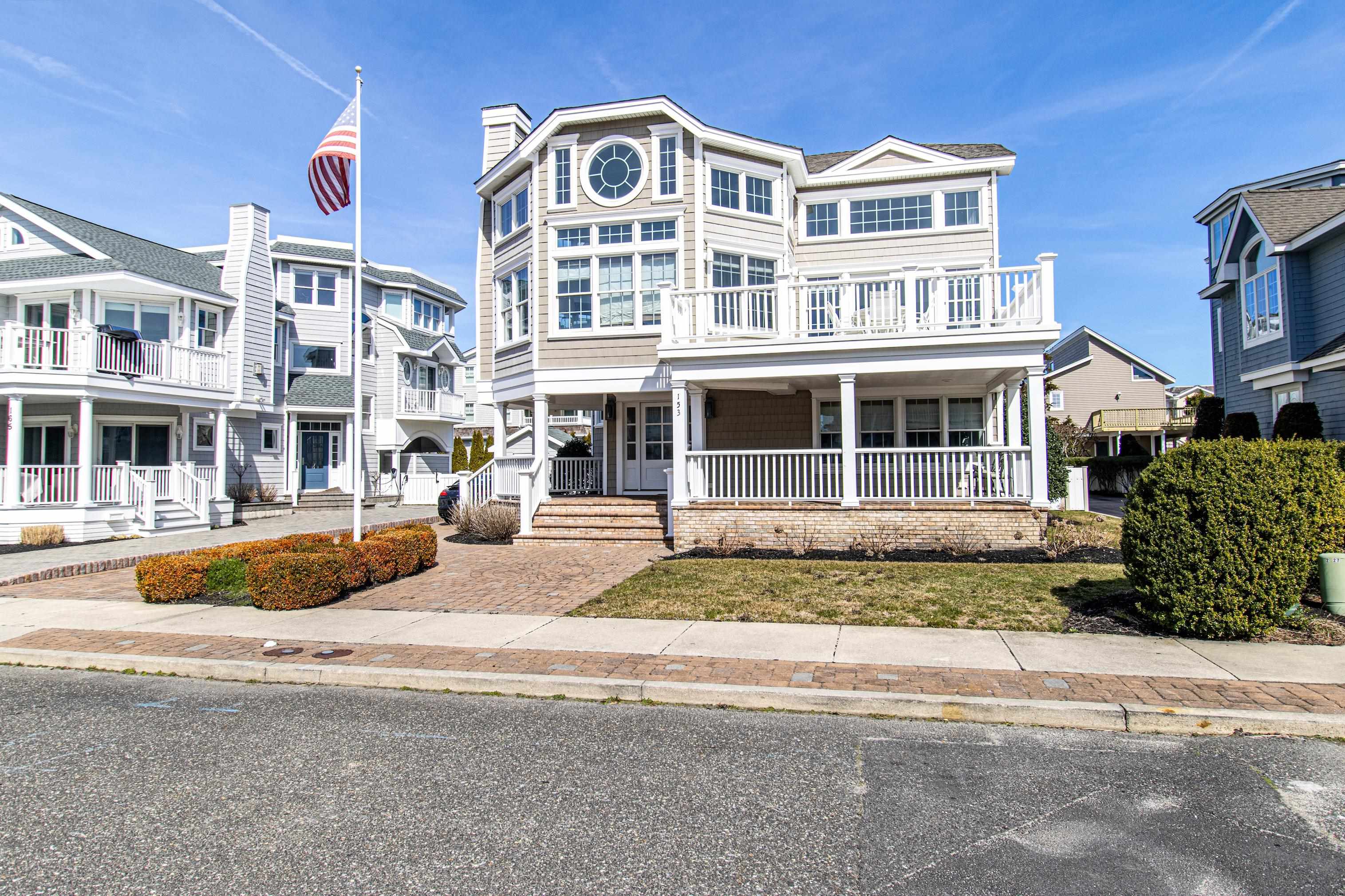 153 76th Street Avalon, NJ 08202 - Photo 1 of 33 a view of a building with a street