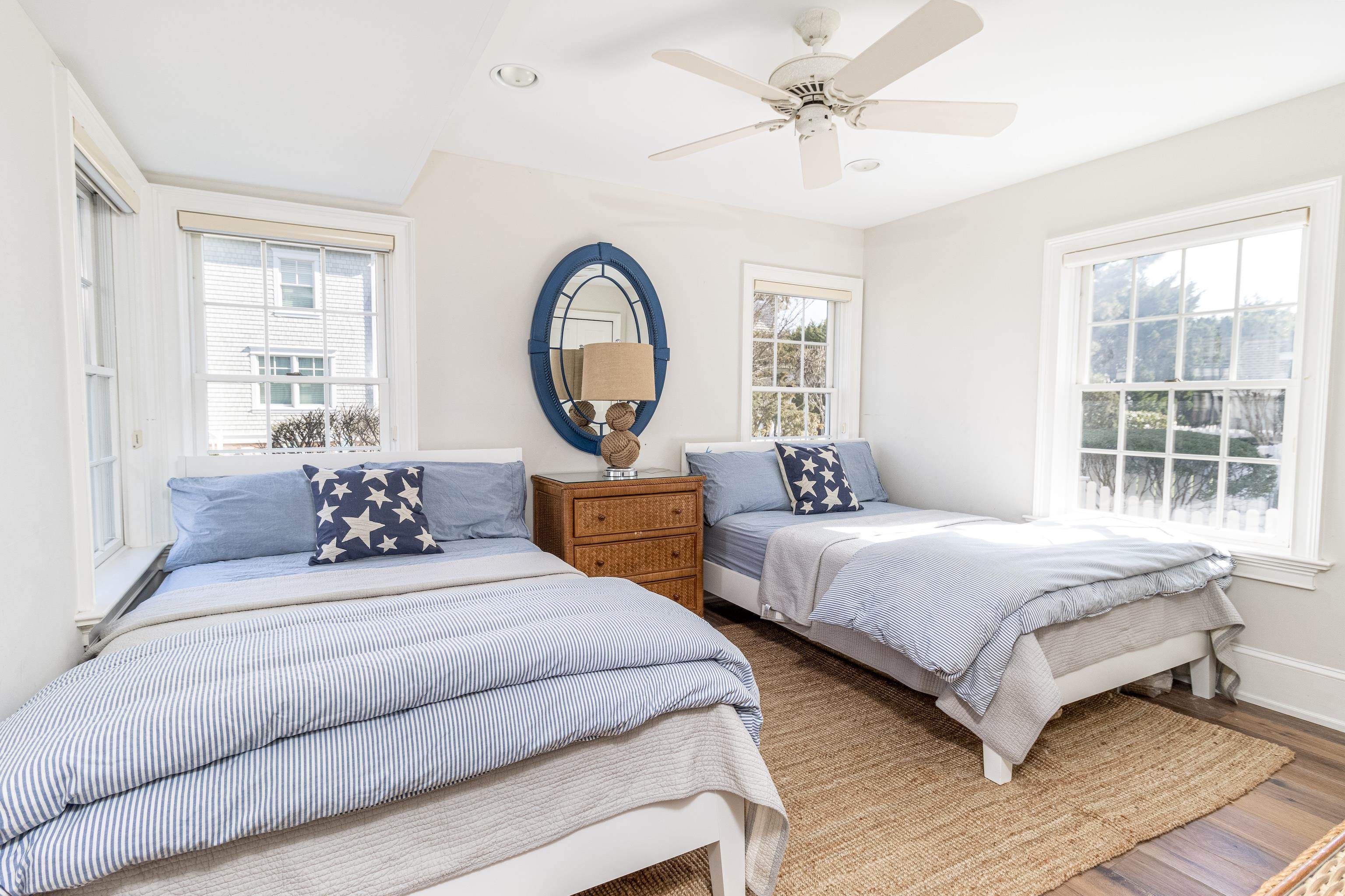 153 76th Street Avalon, NJ 08202 - Photo 12 of 33 a spacious bedroom with two beds and a large window