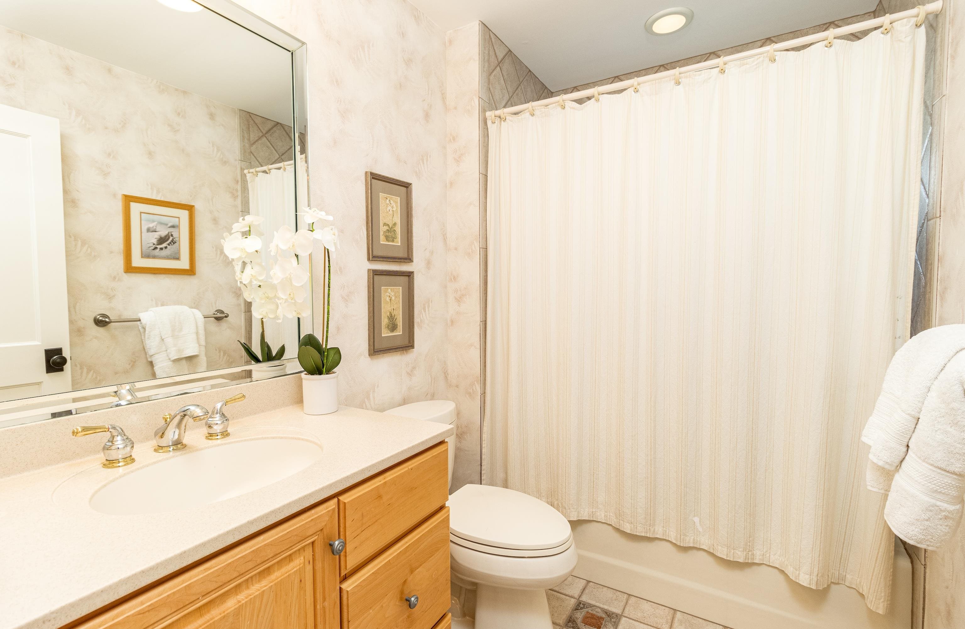 153 76th Street Avalon, NJ 08202 - Photo 13 of 33 a bathroom with a sink toilet and shower