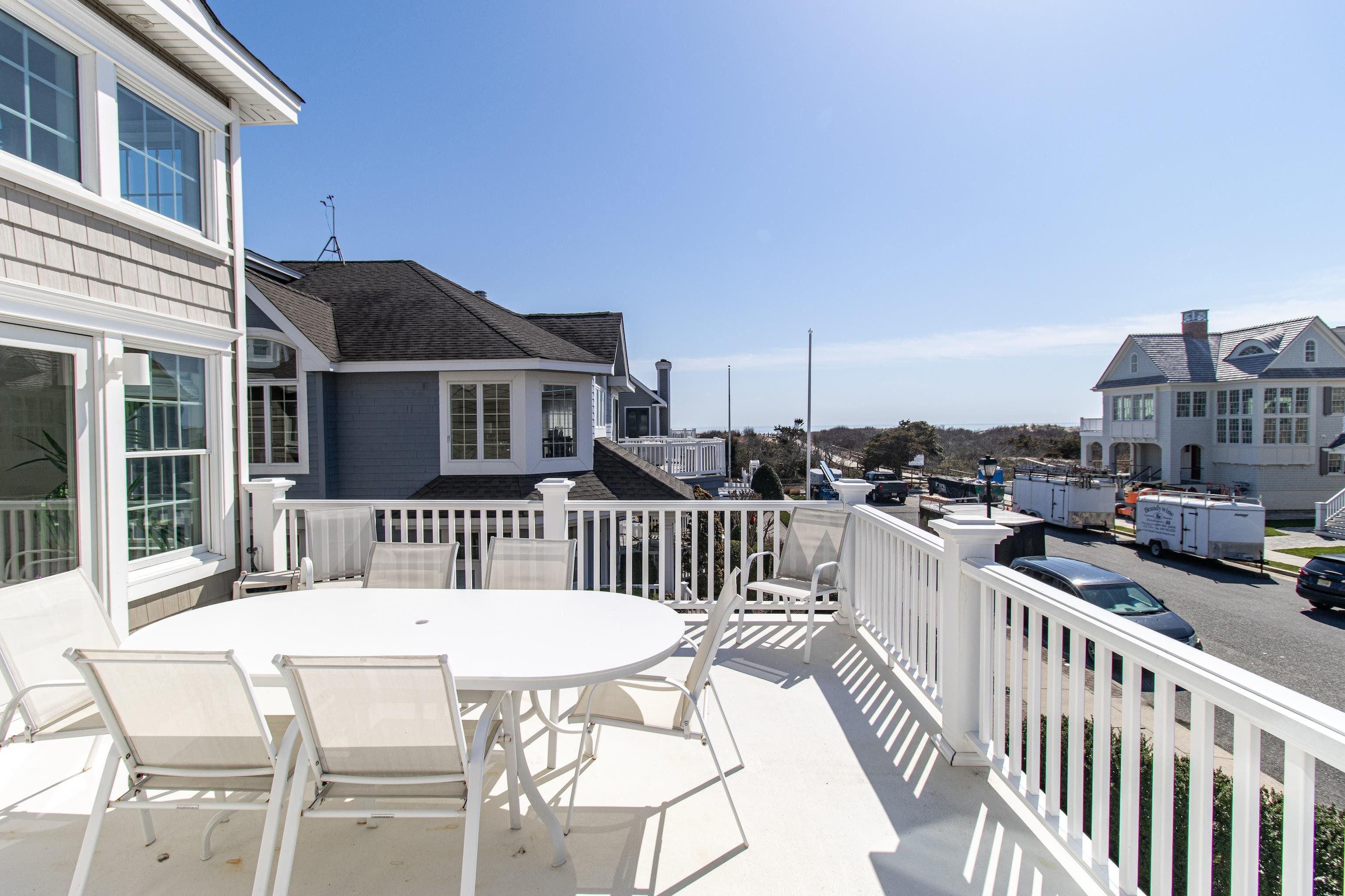 153 76th Street Avalon, NJ 08202 - Photo 26 of 33 a view of a brick wall next to a house