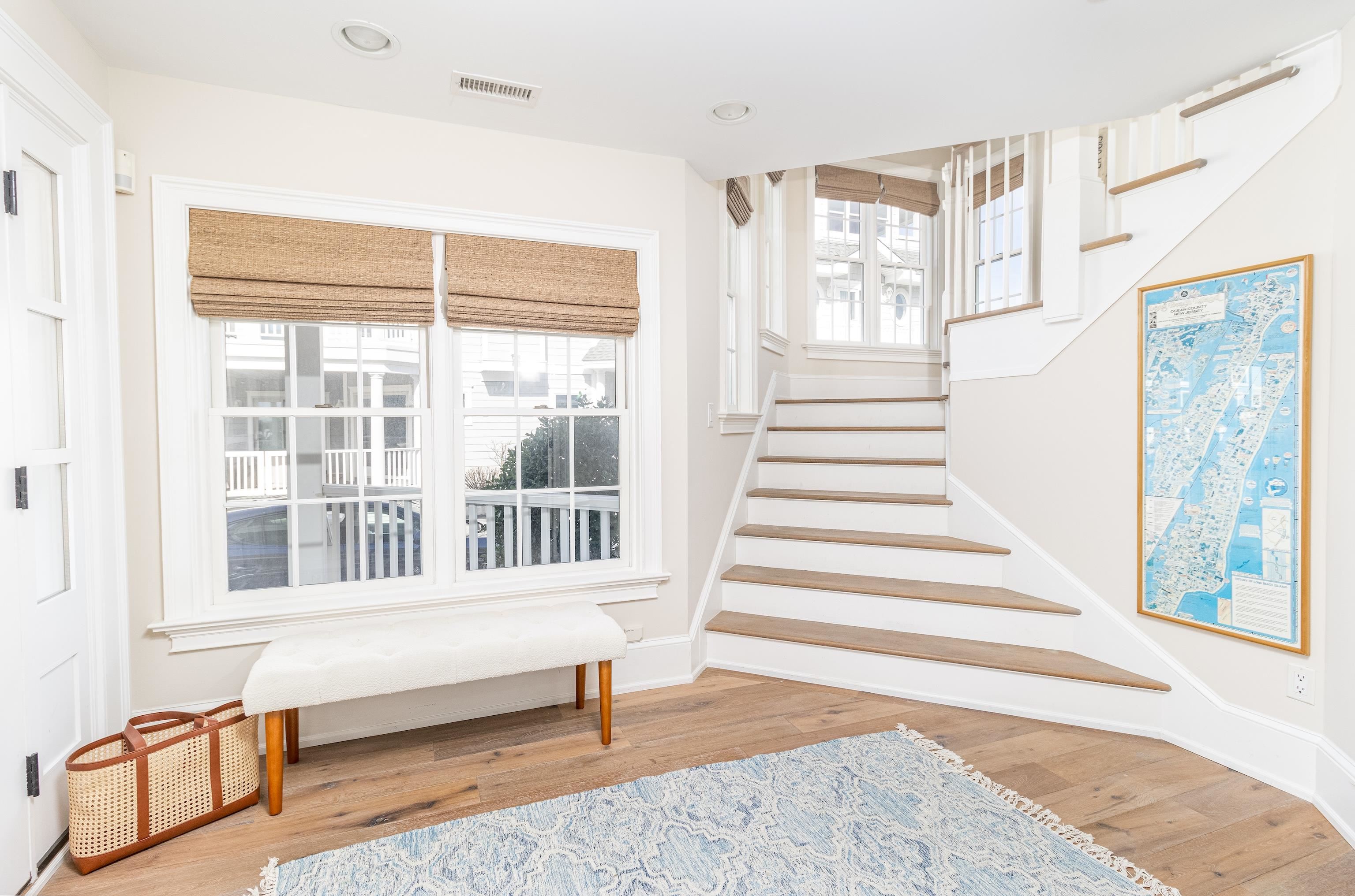 153 76th Street Avalon, NJ 08202 - Photo 5 of 33 a view of a bedroom with wooden floor and windows