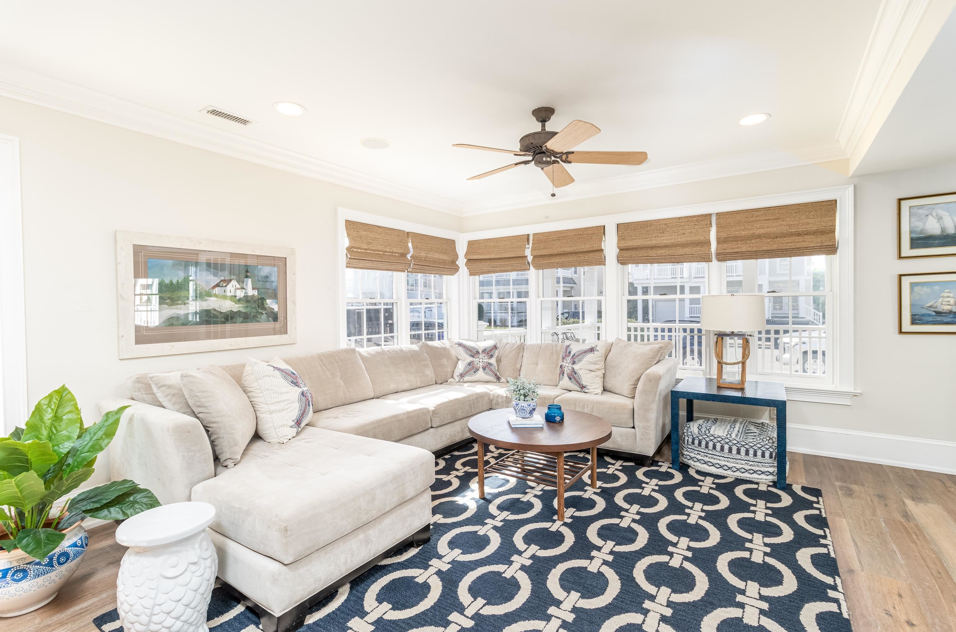 153 76th Street Avalon, NJ 08202 - Photo 8 of 33 a living room with furniture and a window
