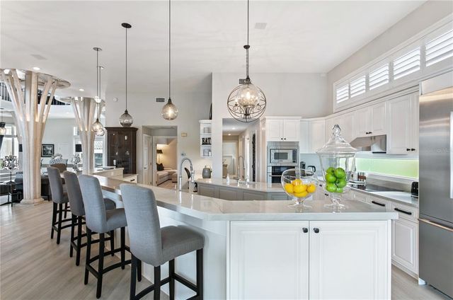 a very nice looking dining room with a table and chairs