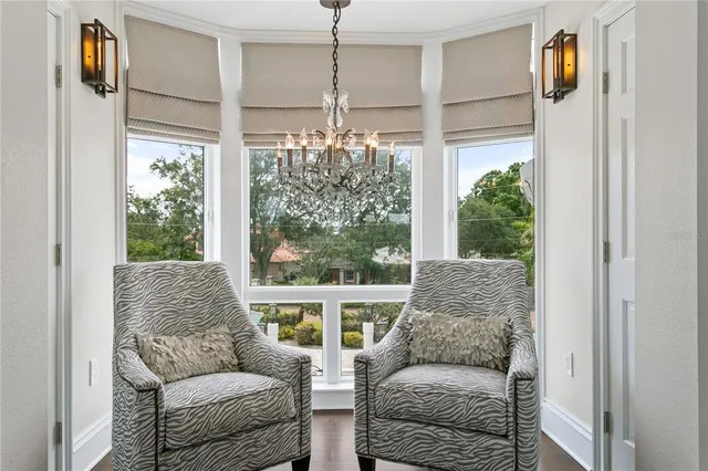 a en suite bathroom with a sink a vanity and mirror