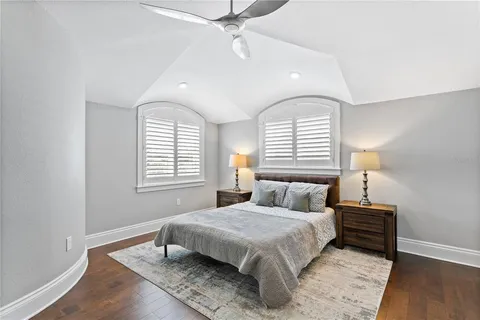 a bathroom with a shower toilet and sink