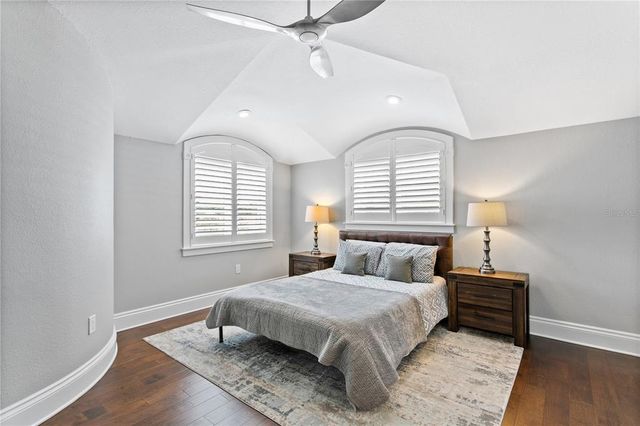a bathroom with a shower toilet and sink