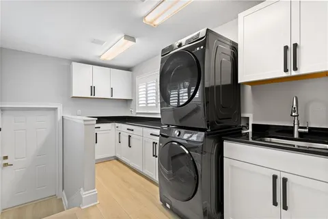 an aerial view of a house with a lake view