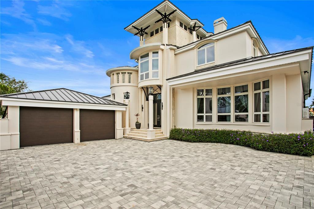 420 Coffee Pot Riviera Northeast St. Petersburg, FL 33704 - Photo 48 of 55 a front view of a house with a yard