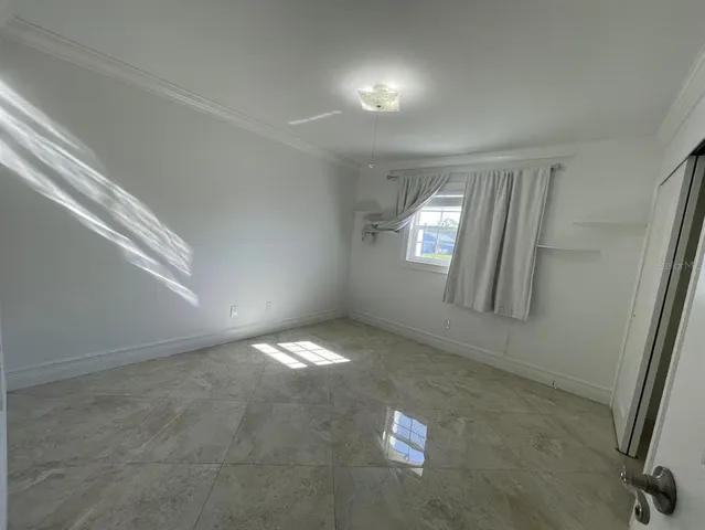 en empty room with windows