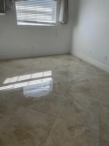 a bathroom with a sink a toilet and bathtub