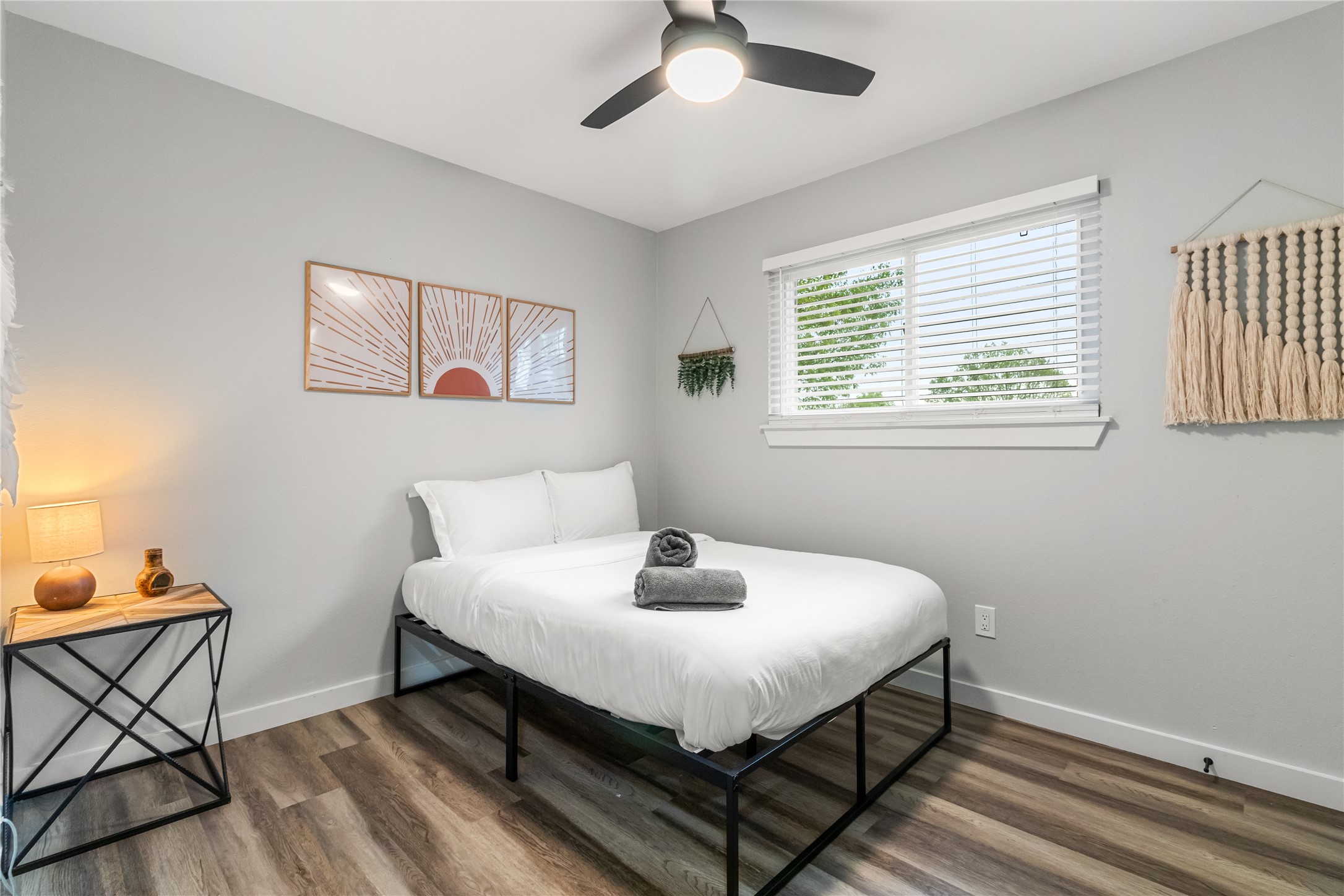 5405 Meadow Crest Austin, TX 78744 - Photo 19 of 33 a bedroom with a bed and window