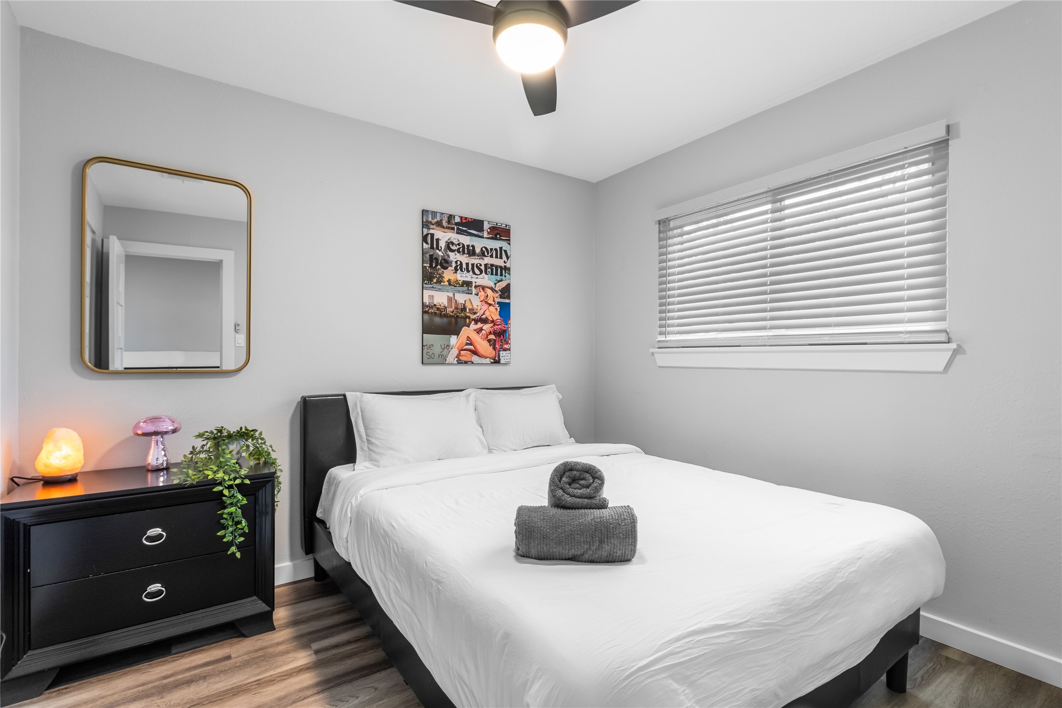 5405 Meadow Crest Austin, TX 78744 - Photo 21 of 33 a bedroom with a bed and a window