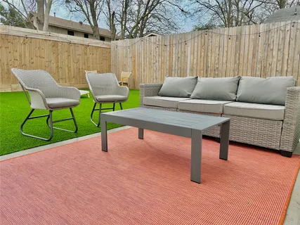 a building view with outdoor seating