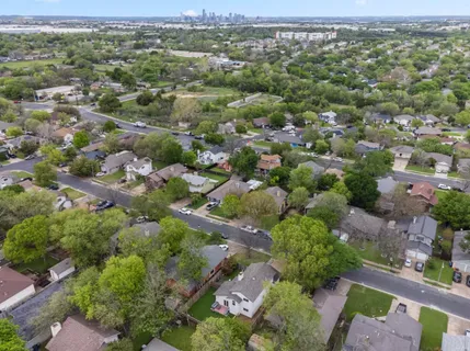 an aerial view of a city with lots of residential buildings