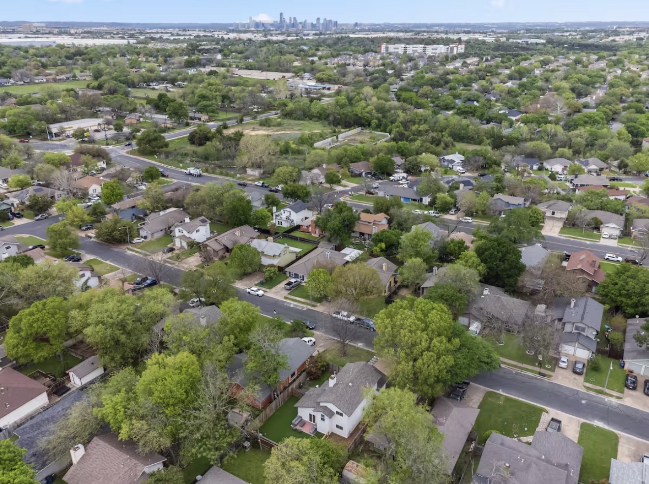5405 Meadow Crest Austin, TX 78744 - Photo 32 of 33 an aerial view of a city with lots of residential buildings