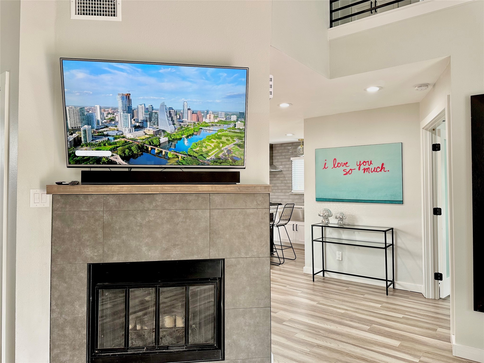 5405 Meadow Crest Austin, TX 78744 - Photo 5 of 33 a view of a fireplace with wooden floor