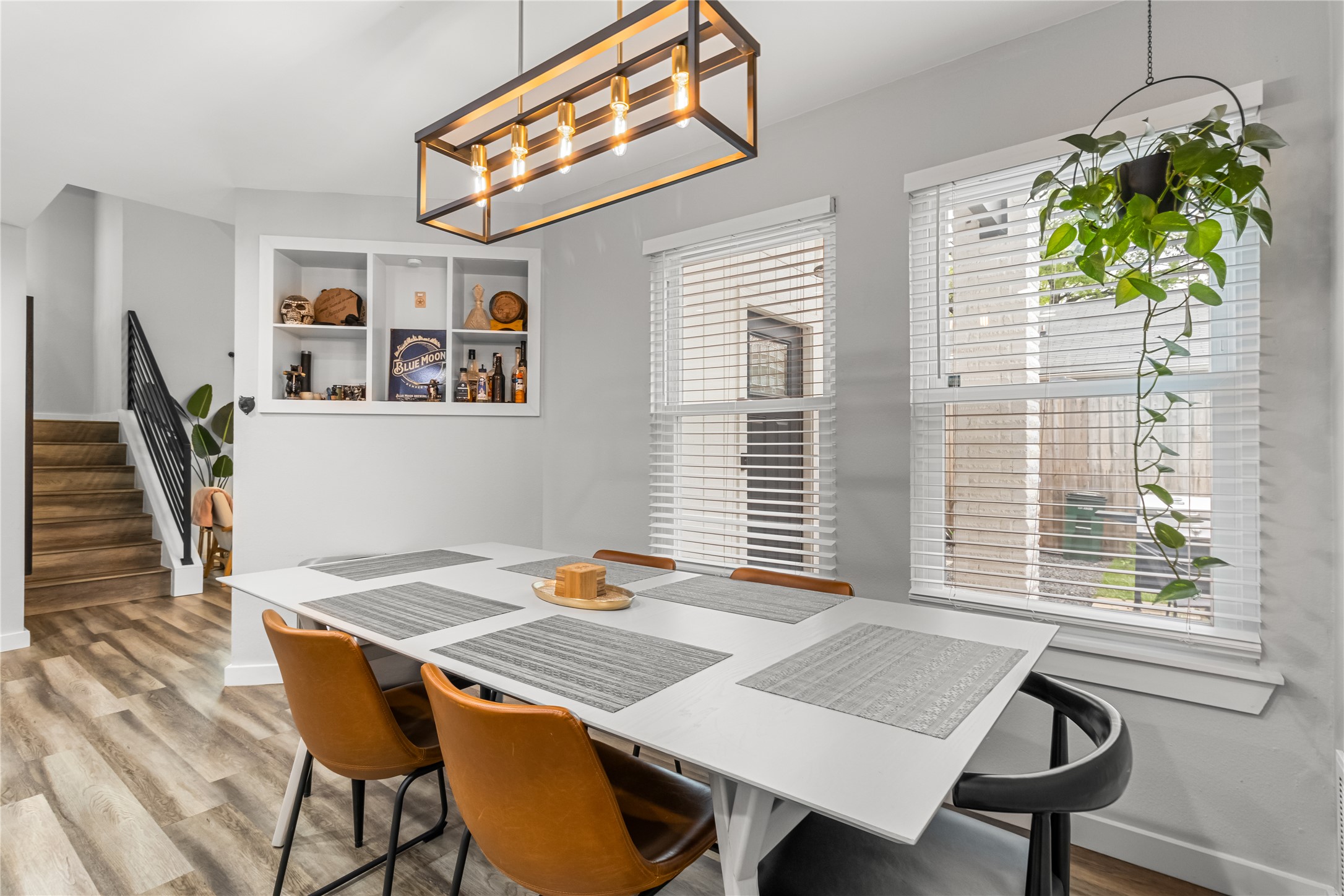 5405 Meadow Crest Austin, TX 78744 - Photo 9 of 33 a view of a dining room with furniture window and wooden floor