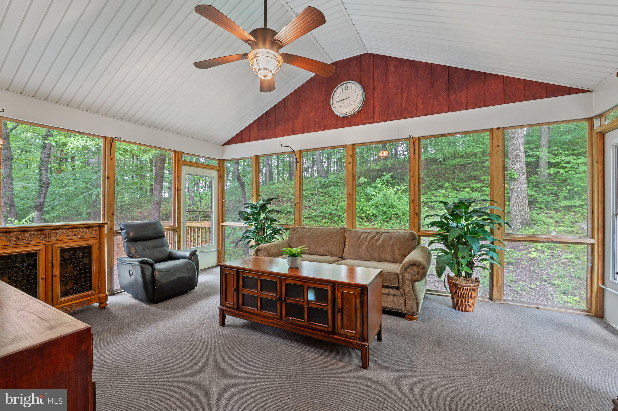 1420 Fishel Road Winchester, VA 22602 - Photo 15 of 34 a living room with furniture and a large window