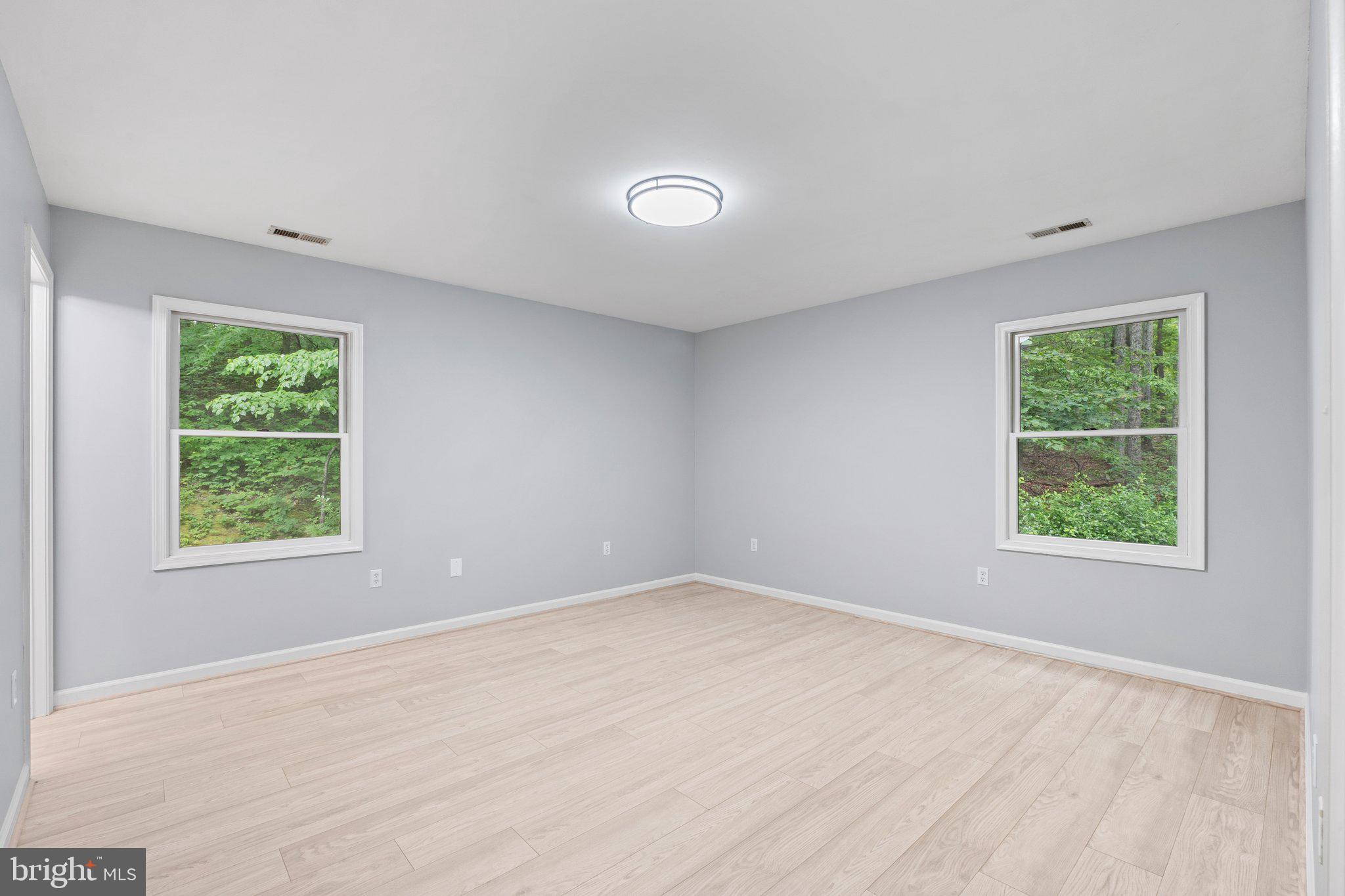1420 Fishel Road Winchester, VA 22602 - Photo 16 of 34 an empty room with windows