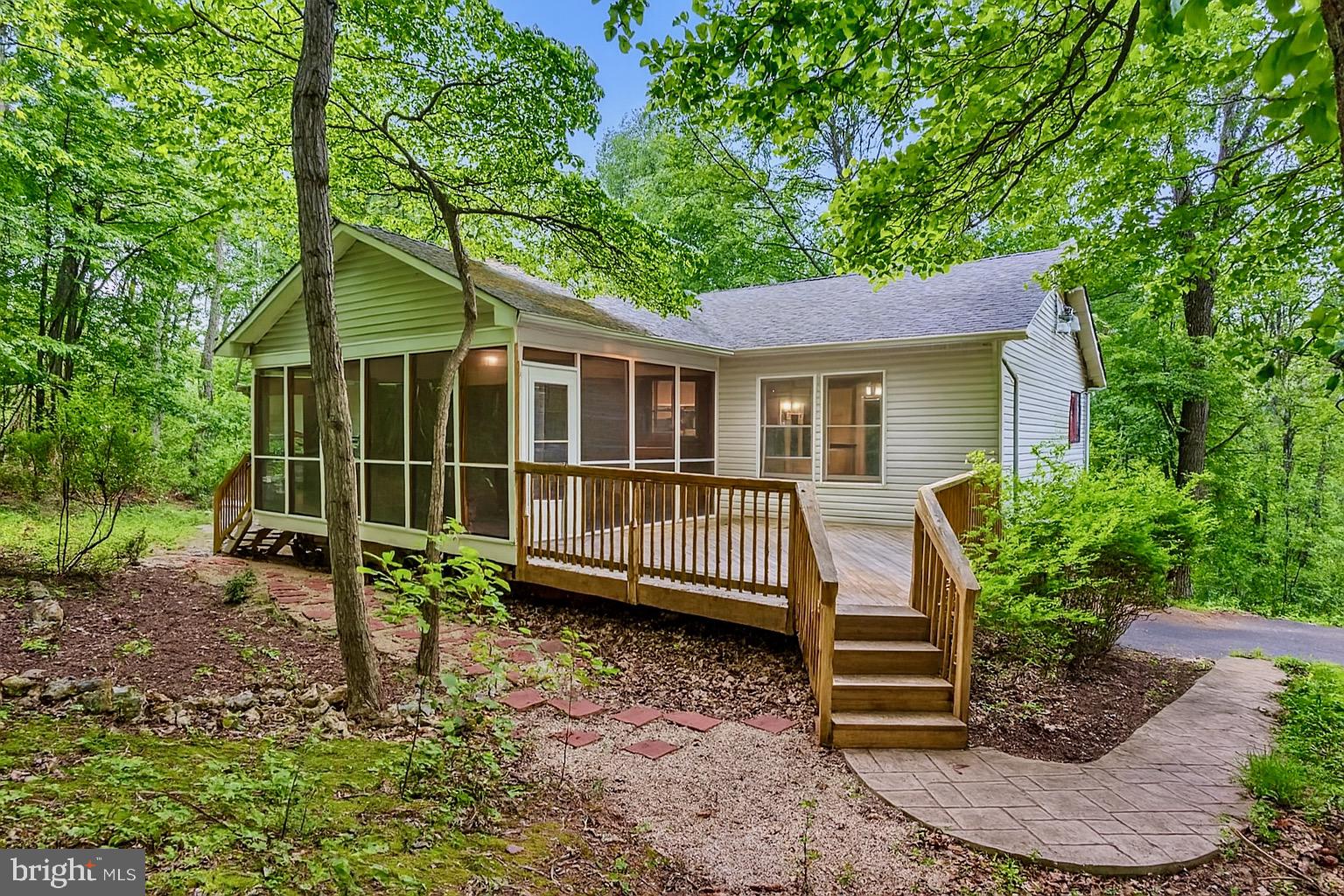 1420 Fishel Road Winchester, VA 22602 - Photo 24 of 34 a view of a house with backyard and sitting area