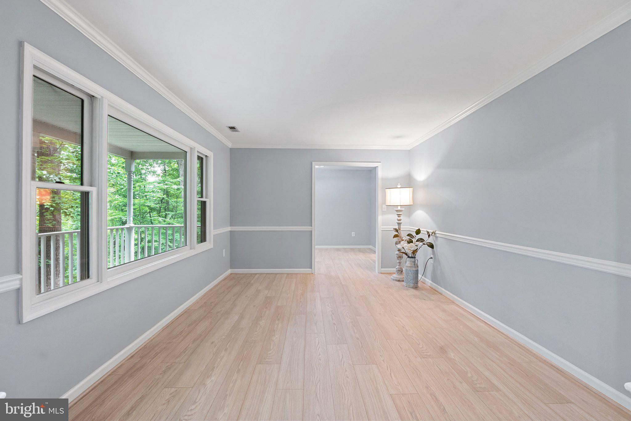 1420 Fishel Road Winchester, VA 22602 - Photo 5 of 34 a view of empty room with wooden floor and fan
