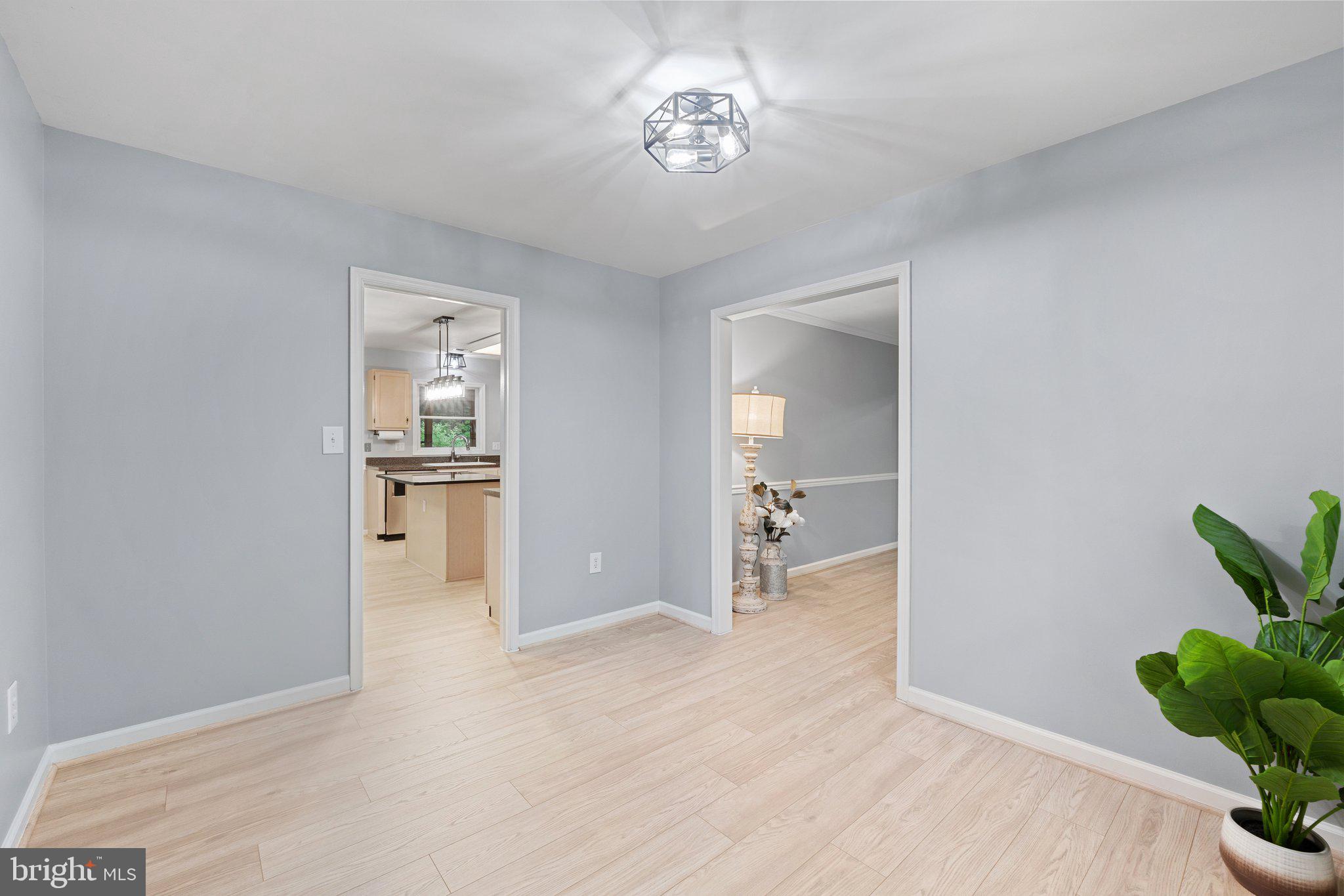 1420 Fishel Road Winchester, VA 22602 - Photo 8 of 34 a view of a livingroom with a potted plant