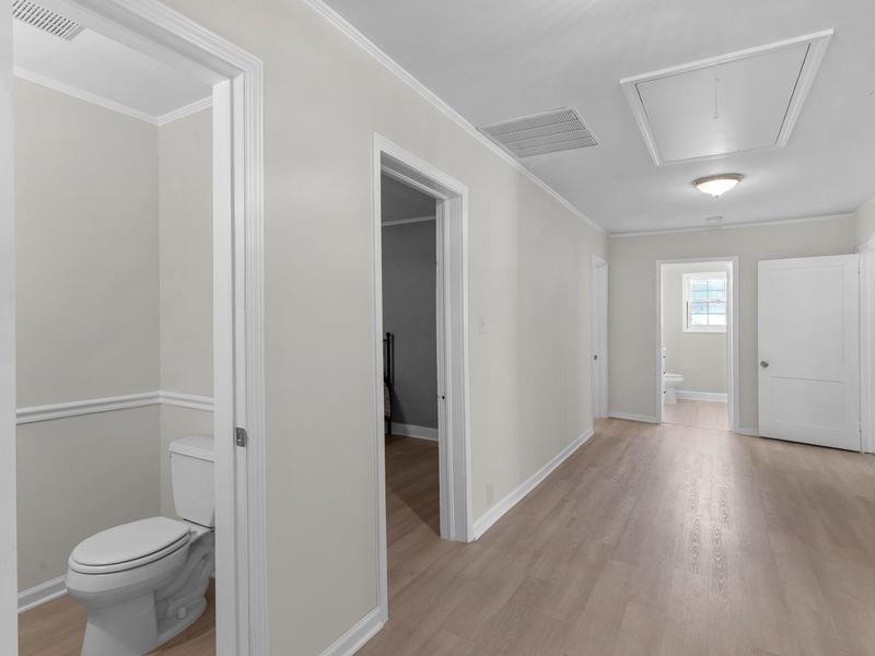 9300 Floyd Road Jonesboro, GA 30236 - Photo 13 of 34 a bathroom with a toilet and a shower