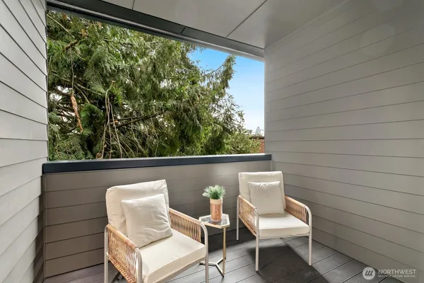a view of a chair in a balcony