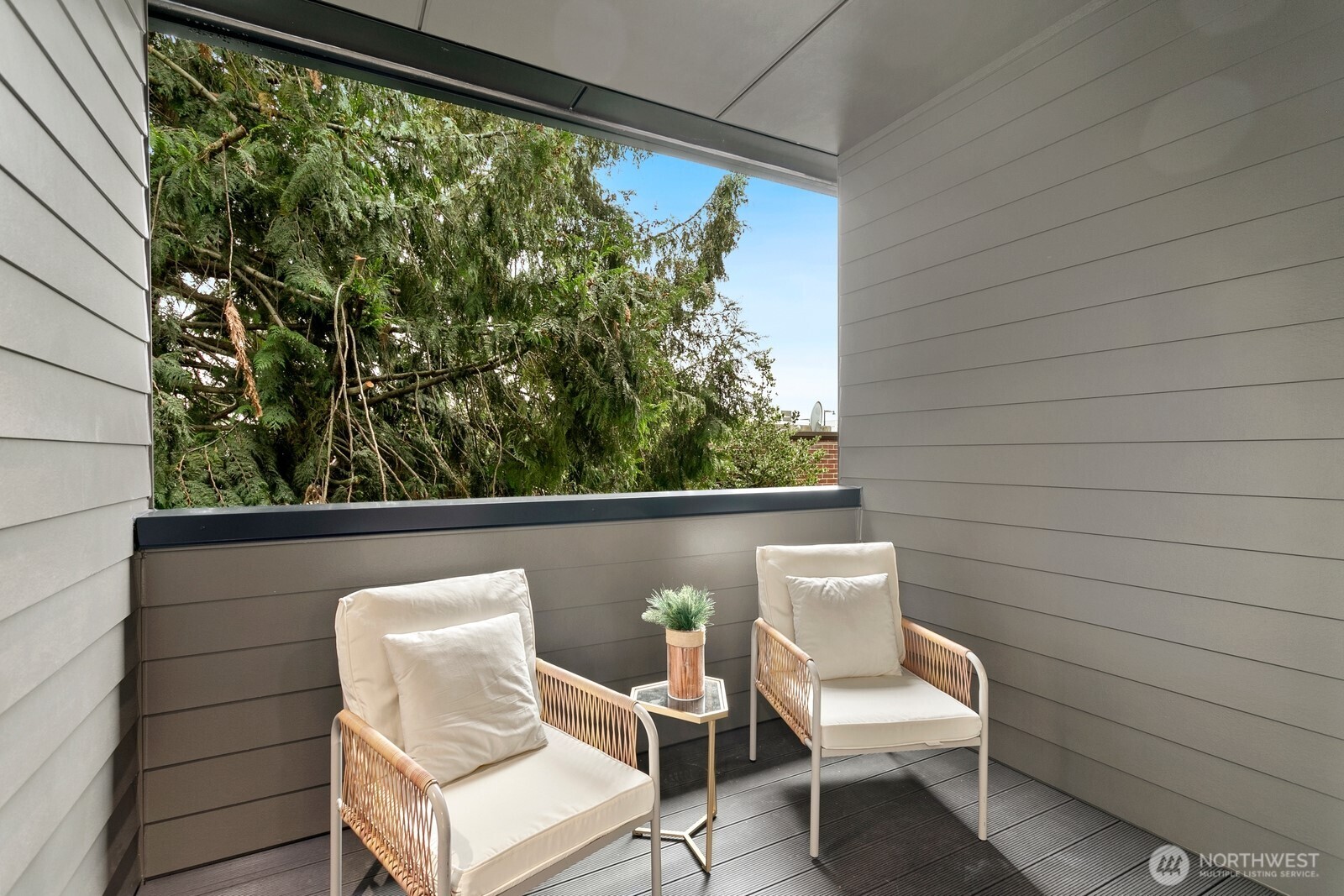 117 Wells Avenue South, Unit A Renton, WA 98057 - Photo 16 of 31 a view of a chair in a balcony