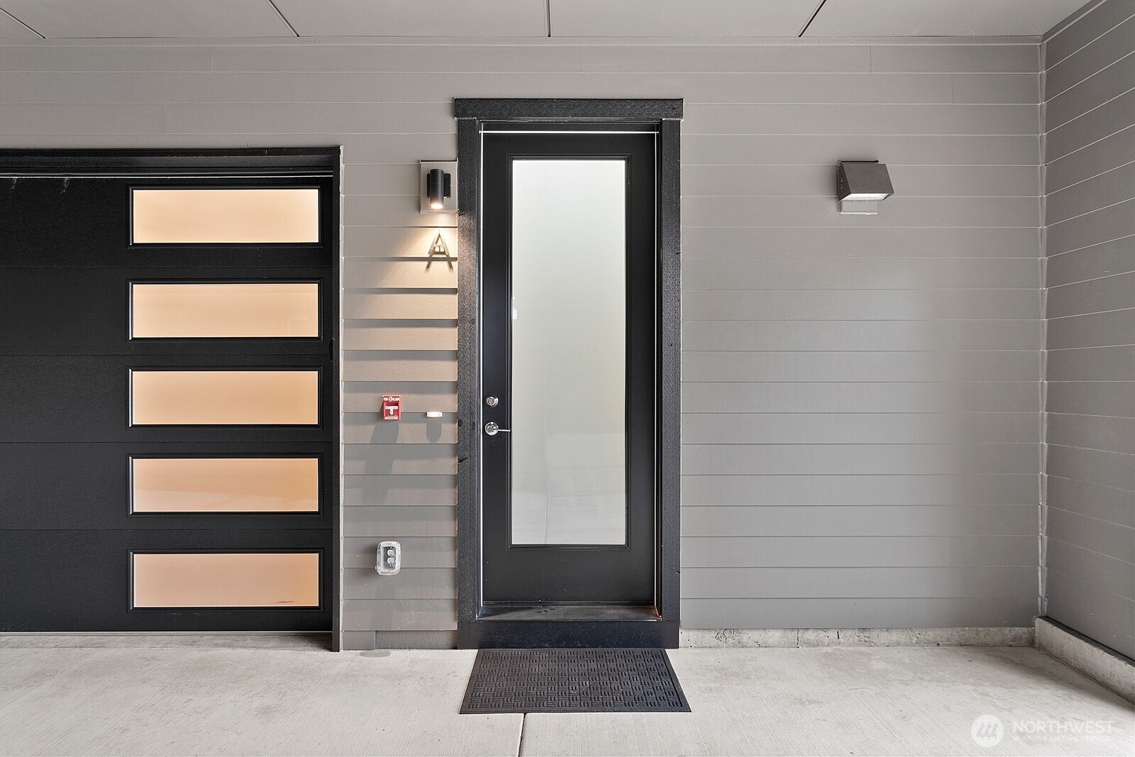 117 Wells Avenue South, Unit A Renton, WA 98057 - Photo 5 of 31 a view of a door house with a door