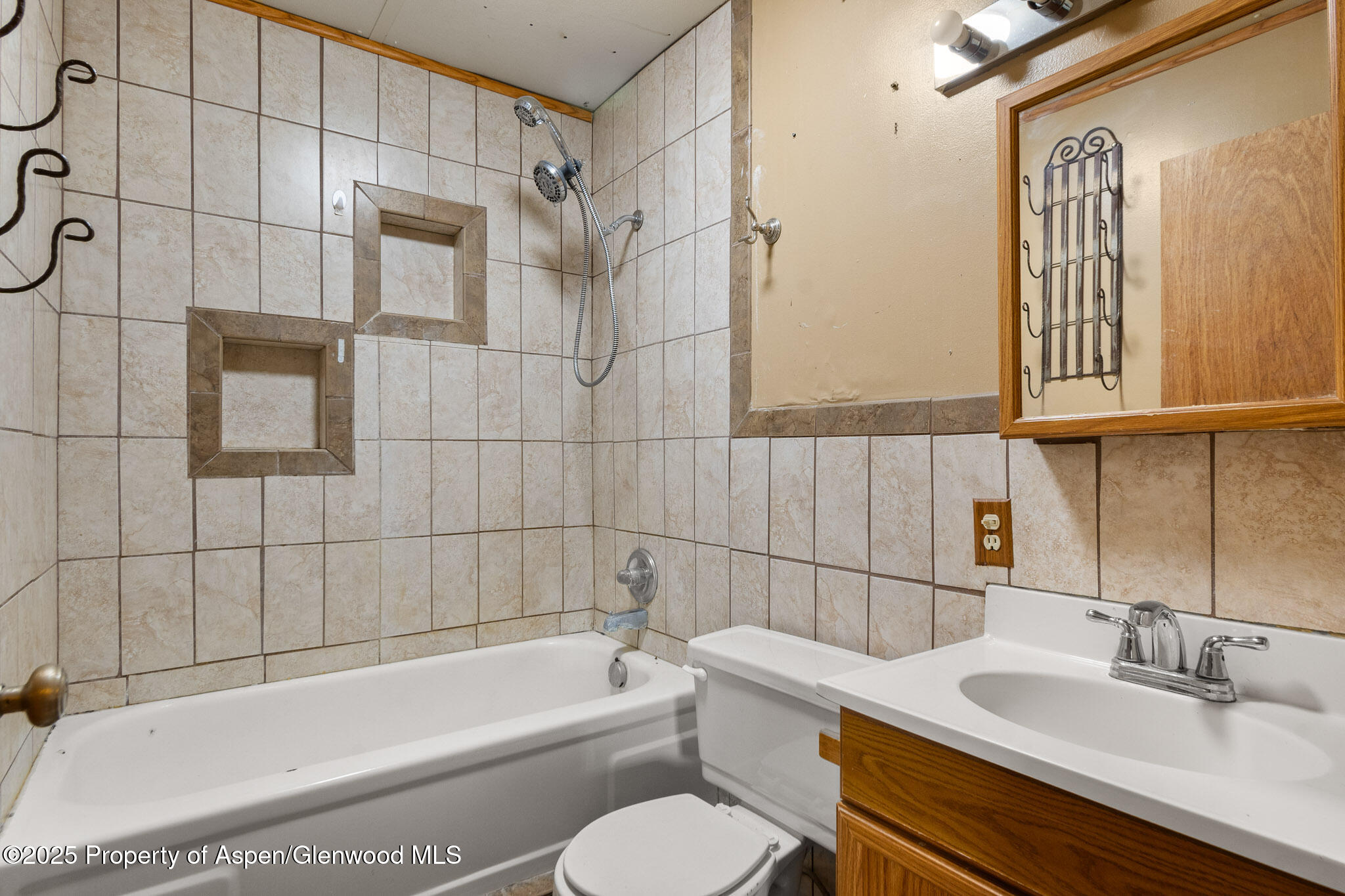 580 Will Avenue Rifle, CO 81650 - Photo 11 of 24 a bathroom with a sink a toilet and shower