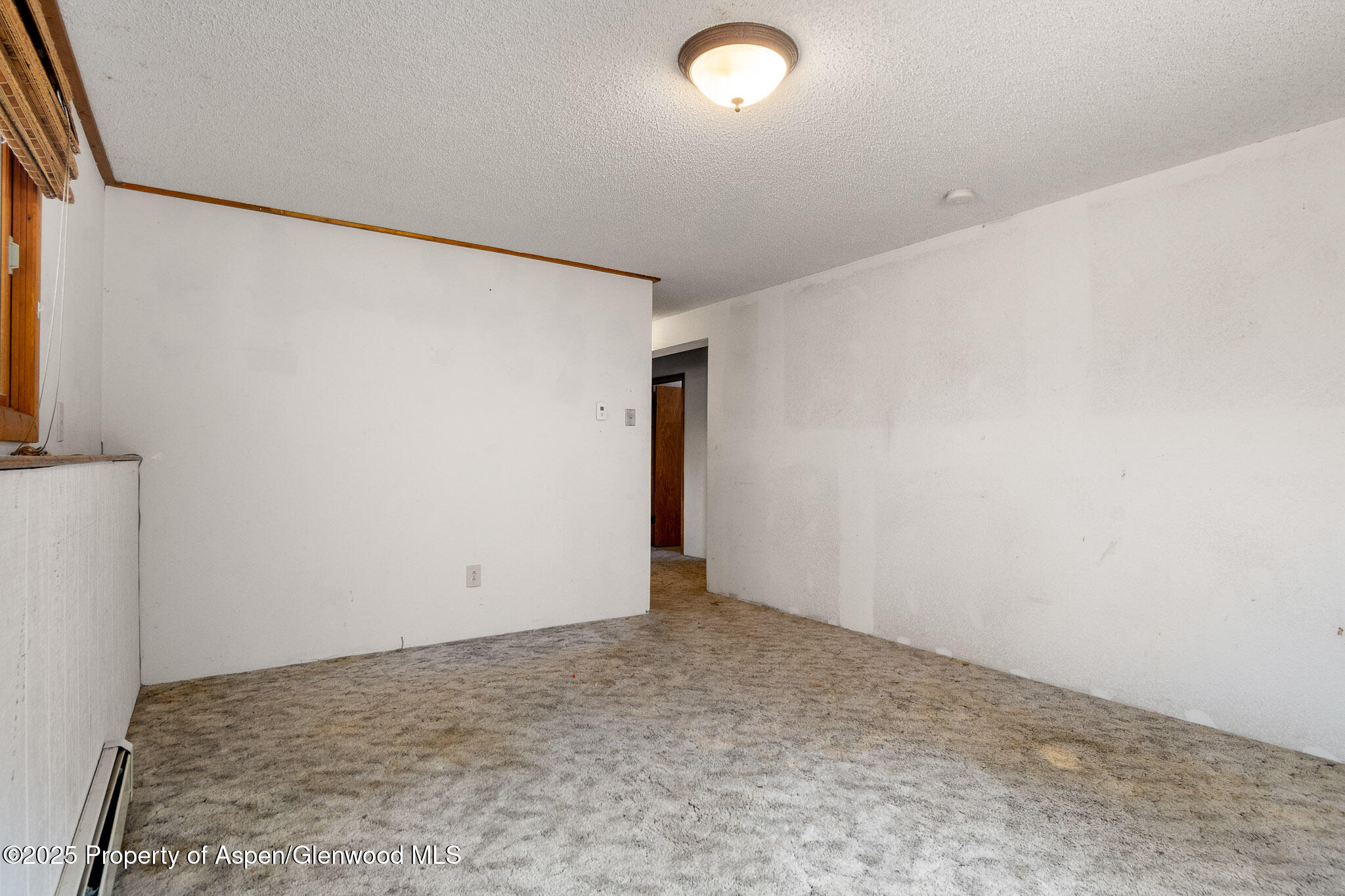 580 Will Avenue Rifle, CO 81650 - Photo 14 of 24 an empty room with an entryway
