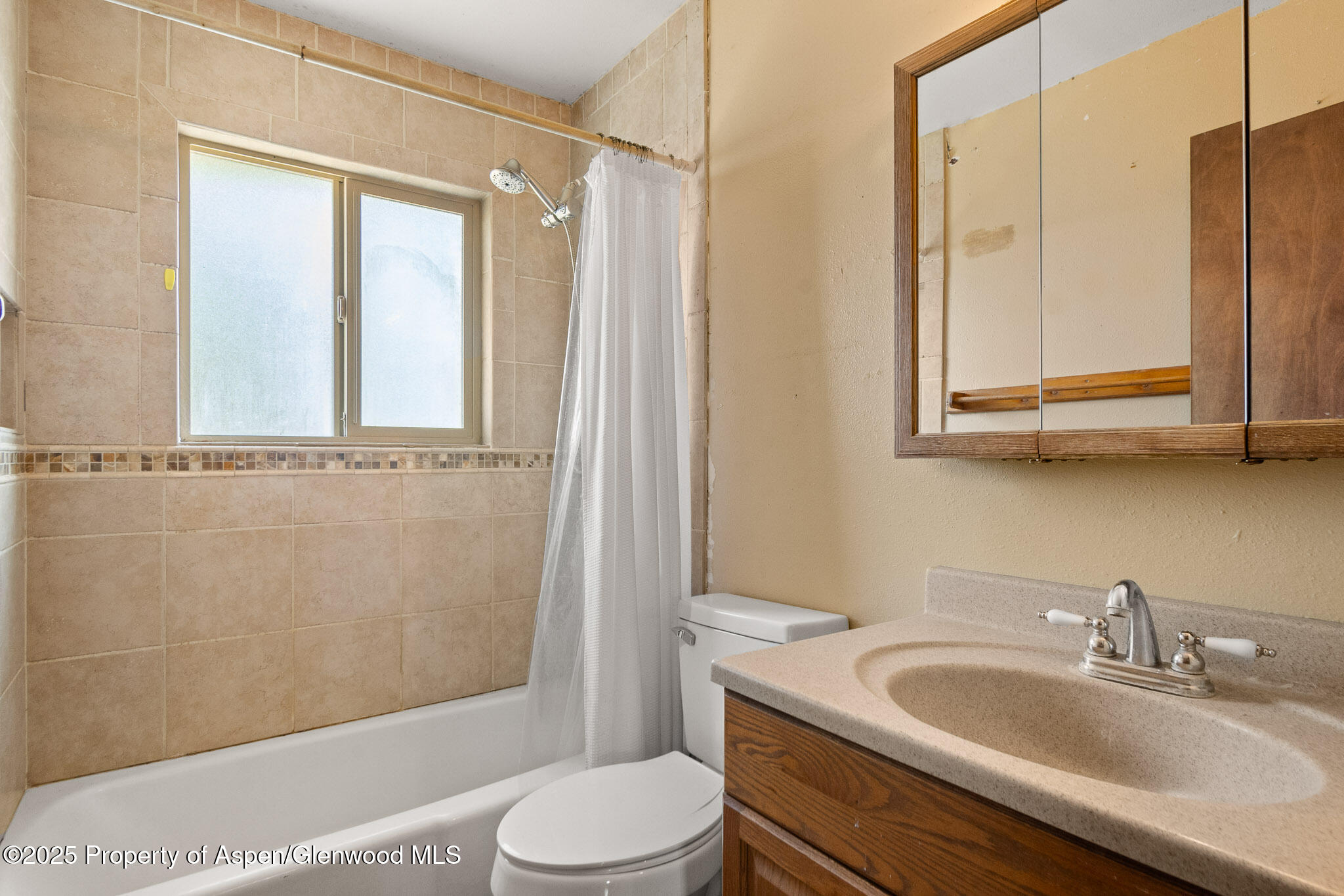 580 Will Avenue Rifle, CO 81650 - Photo 18 of 24 a bathroom with a sink a toilet and shower