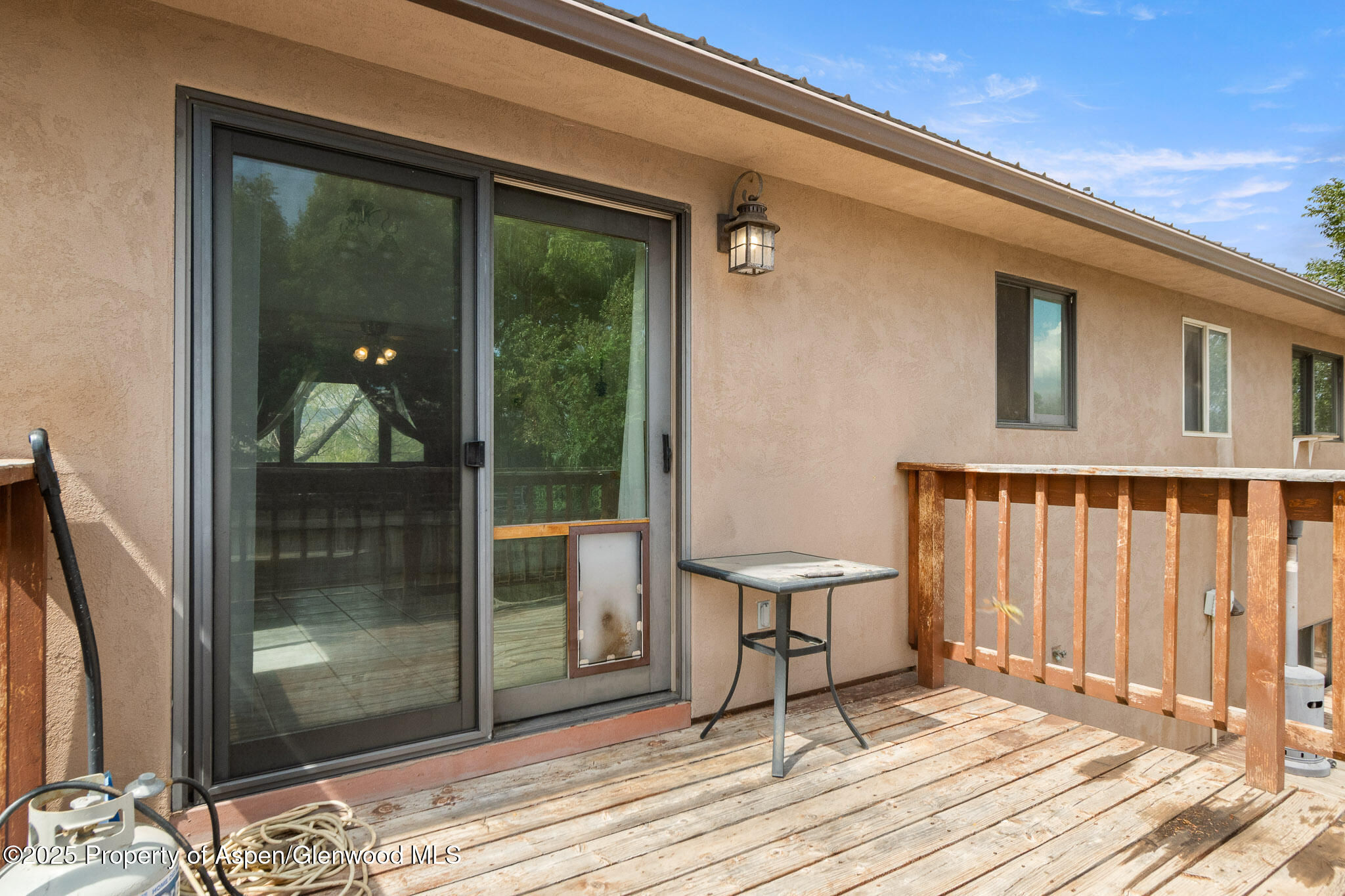 580 Will Avenue Rifle, CO 81650 - Photo 24 of 24 a balcony view with a glass door and glass door