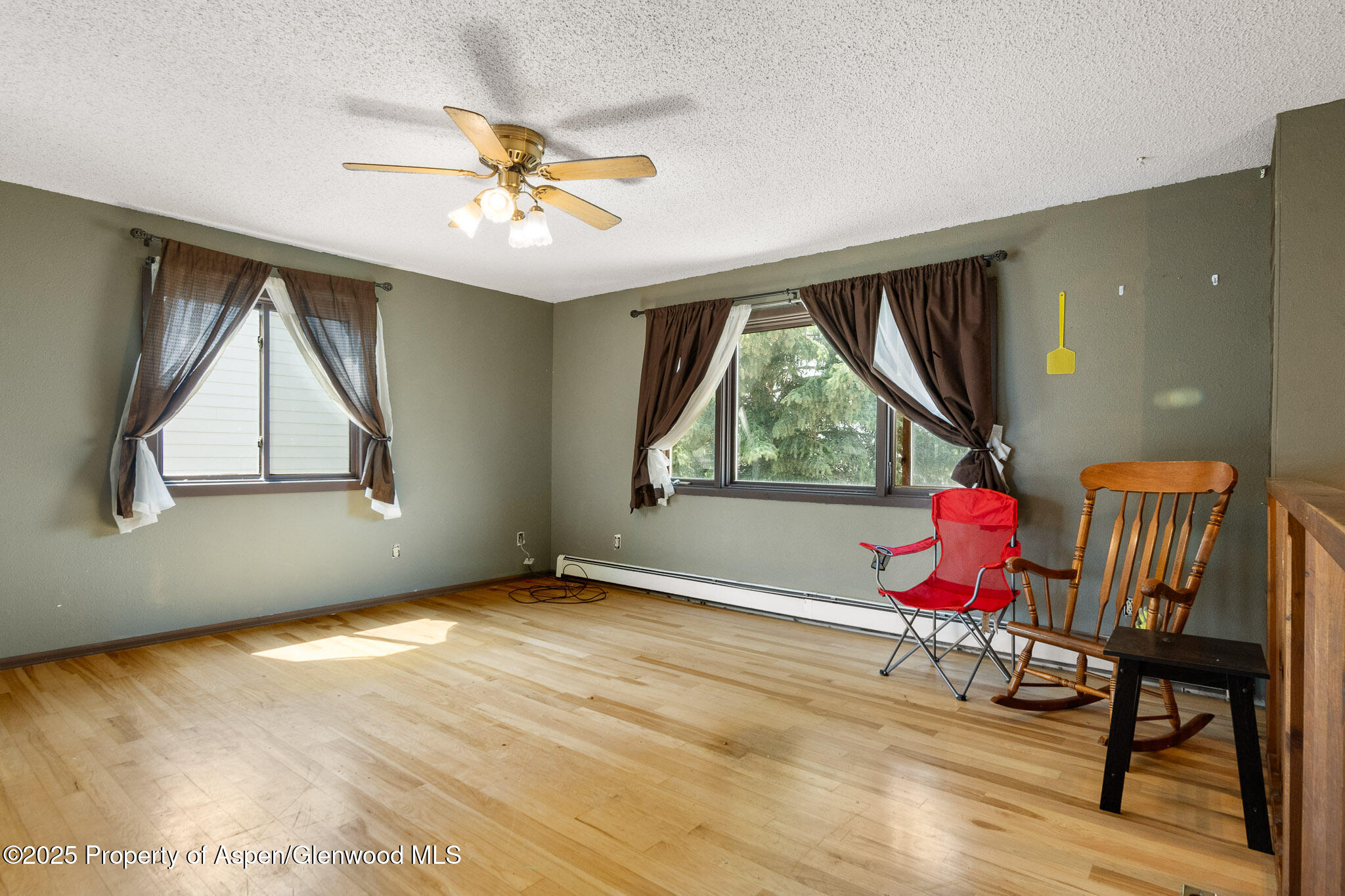 580 Will Avenue Rifle, CO 81650 - Photo 4 of 24 a living room with furniture and a window
