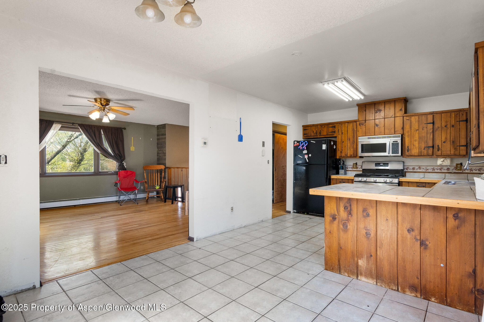 580 Will Avenue Rifle, CO 81650 - Photo 8 of 24 a view of a kitchen and utility room