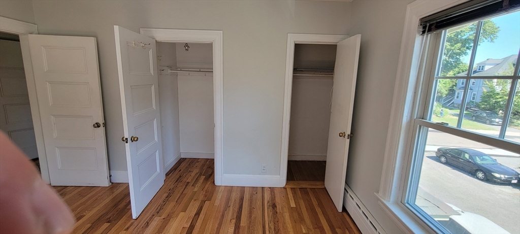 88 Corey Street, Unit 2 Boston, MA 02132 - Photo 13 of 23 a view of a bedroom from a balcony