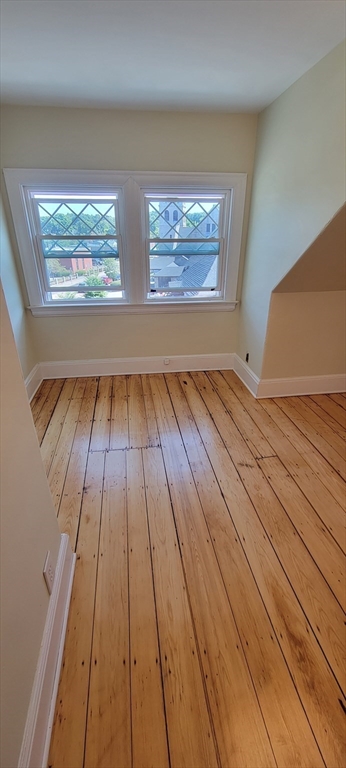 88 Corey Street, Unit 2 Boston, MA 02132 - Photo 19 of 23 a view of wooden floor