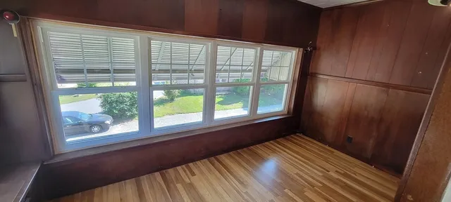 a view of entryway with wooden floor