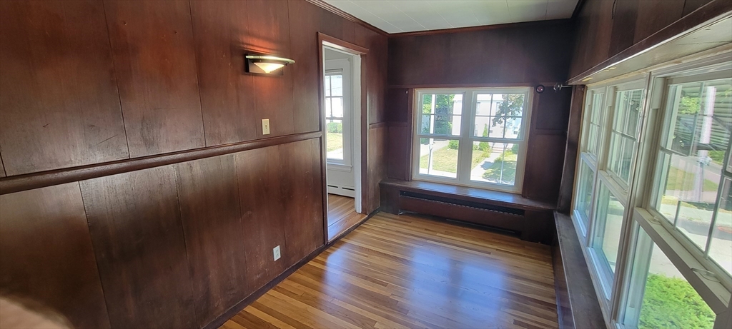 88 Corey Street, Unit 2 Boston, MA 02132 - Photo 9 of 23 a view of entryway with wooden floor