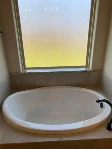 a bathroom with a bathtub