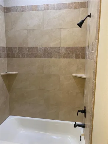 a bathroom with a bathtub