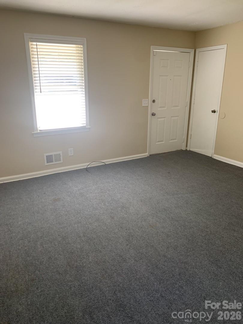 436 Green Tree Circle Columbia, SC 29203 - Photo 3 of 12 an empty room with a window