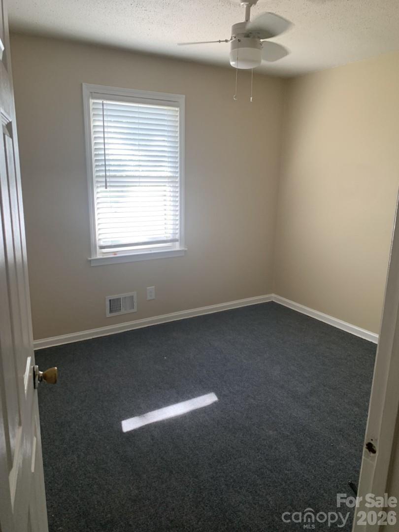 436 Green Tree Circle Columbia, SC 29203 - Photo 5 of 12 an empty room with a window