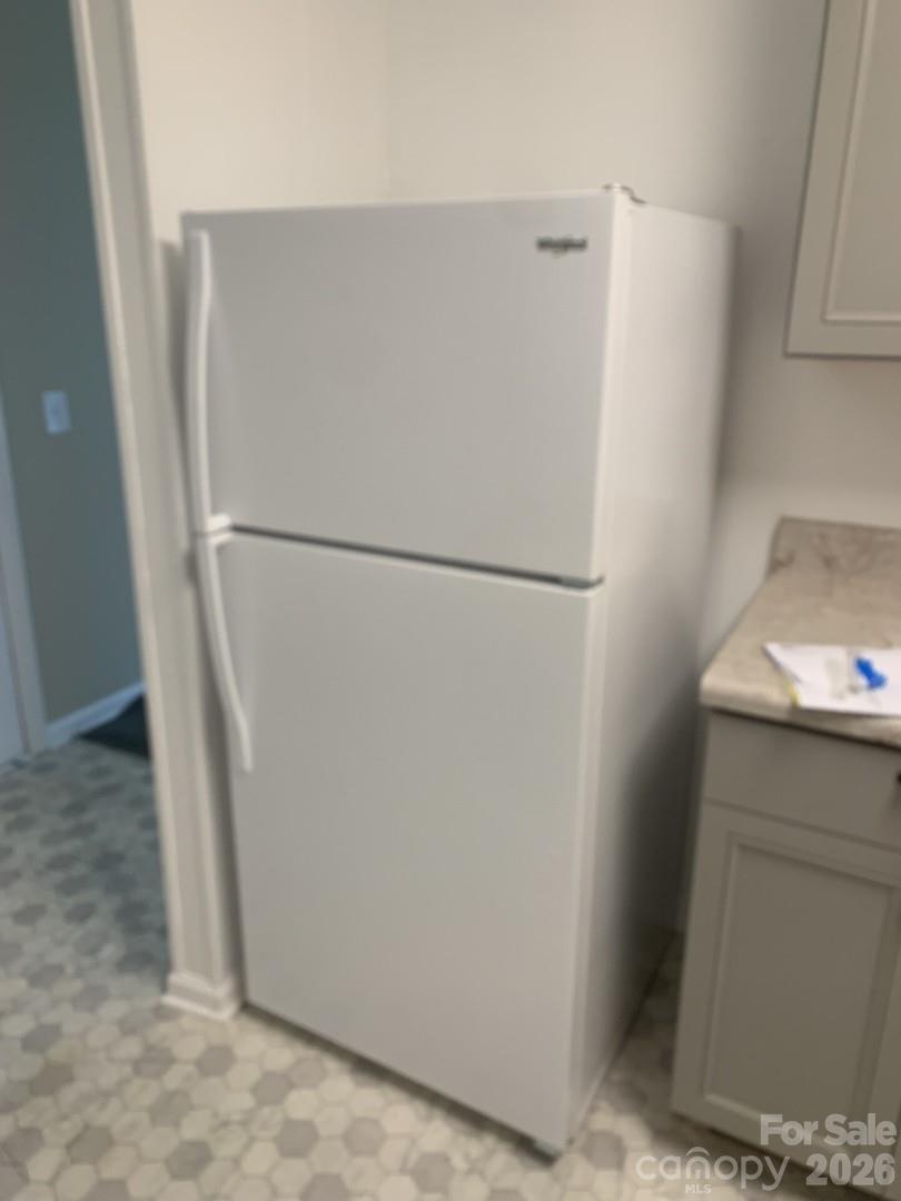 436 Green Tree Circle Columbia, SC 29203 - Photo 9 of 12 a white refrigerator freezer sitting inside of a kitchen