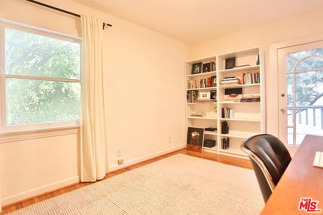 a bathroom with a sink a toilet and a shower